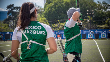 Mexico’s Ana Vazquez and Angel Alvarado shoot in the mixed team eliminations at the first stage of the 2021 Hyundai Archery World Cup in Guatemala City.