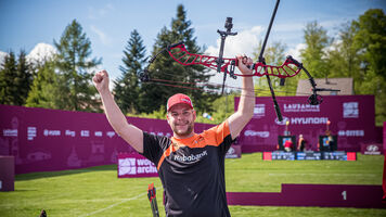 Mike Schloesser celebrates winning the second stage of the Hyundai Archery World Cup in 2021.