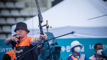 Sjef van den Berg shoots during finals at the third stage of the 2021 Hyundai Archery World Cup in Paris.