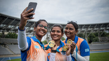 The Indian recurve women’s team poses with its gold medal in Paris.