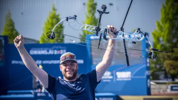 Mike Schloesser celebrates winning stage two in Gwangju.