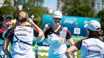 The German women's recurve team celebrates at the Antalya 2021 European Championships. 