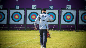 Oh Jin Hyek walks the field at the Tokyo 2020 Olympic Games. 
