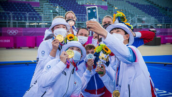 The women's teams celebrate their medals at the Tokyo 2020 Olympic Games. 
