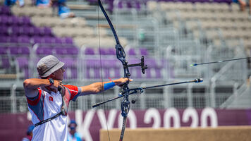 Mete Gazoz shoots at the Tokyo 2020 Olympic Games.