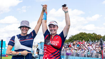 Casey Kaufhold celebrates World Cup gold in Paris with opponent Lisa Barbelin.