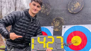 Tim Jevsnik poses with 1427 points on the board.