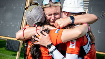 Dutch women celebrate winning an Olympic quota place.