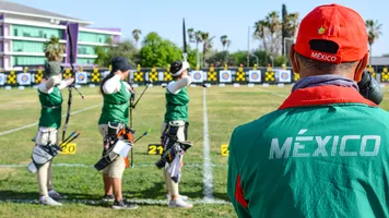 Mexico coach watching Mexican recurve women team.