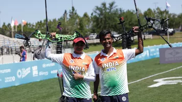 Jyothi Surekha Vennam and Rishabh Yadav celebrating.