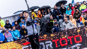 Camera behind archer at Berlin 2023.