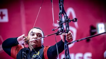 Ajay Scott aiming.