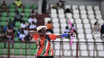 Gloria Kitali aiming in the Barebow Women final.
