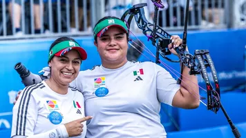 Andrea Becerra with coach Karan Montellano at Chengdu 2025 World Games.