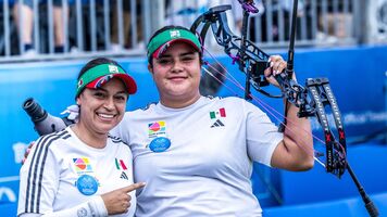 Andrea Becerra with coach Karan Montellano at Chengdu 2025 World Games.