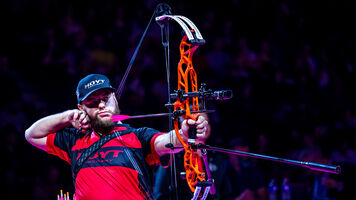 Mike Schloesser shooting at Nimes 2026 indoor tournament.