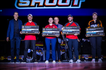 Archers pose with their awards