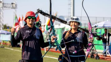 Rezza Octavia at the 2022 Islamic Solidarity Games with mixed team partner Riau Salsabilla.