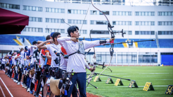 Lee Wooseok aiming on the end of the recurve men line at the Yuanshen Sports Centre at Shanghai 2025.