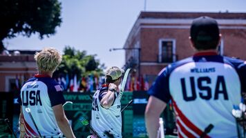 Christian Stoddard, Jack Williams watching Brady Ellison shoot the winning arrow in the recurve men team final at Puebla 2026.