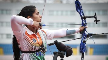 Simranjeet Kaur aiming at the Yuanshen Sports Centre during recurve women eliminations at Shanghai 2026.