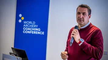 Goktug Ergin speaking at the World Archery Coaching Conference.