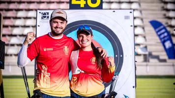 Andres Temino Mediel and Elia Canales smiling at the target together at Madrid 2026.