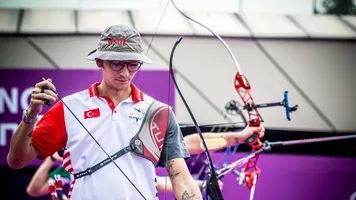 An athlete ready on the shooting line